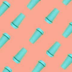 Turquoise bamboo coffee mug on a coral background without shadows in pattern