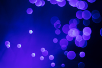 Glowing colored blurred dots. Colored fantasies. Bokeh.