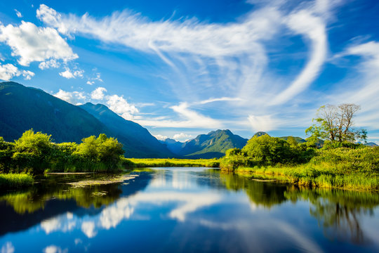 Passion of reflection along Pitt lake in British Columbia, Canada