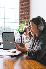 Woman recording a podcast