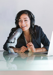 Businesswoman interviewed for a podcast - 339840393