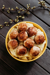 Homemade meatballs fried. Dark background.