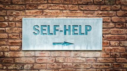 Fototapeta na wymiar Street Sign to Self-Help