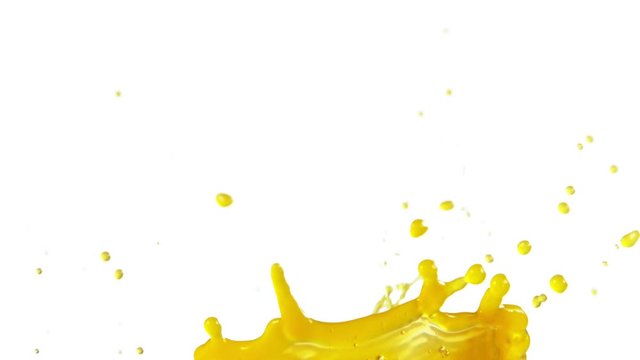 Super slow motion of orange juice splash isolated on white background. Filmed on high speed cinema camera, 1000 fps.