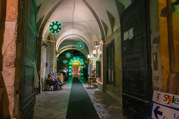 Fototapeta premium Night view of a street in the historic center of Lecce in Puglia, Italy..