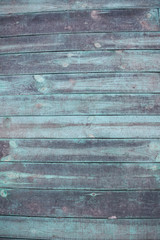 Shabby light-green painted wooden planks with copyspace (vertical photo)