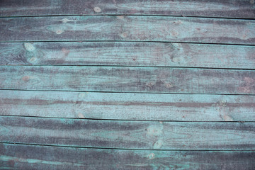 Shabby light-green painted wooden planks with copyspace