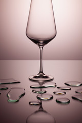 Empty wine glasses on a clean gradient background.