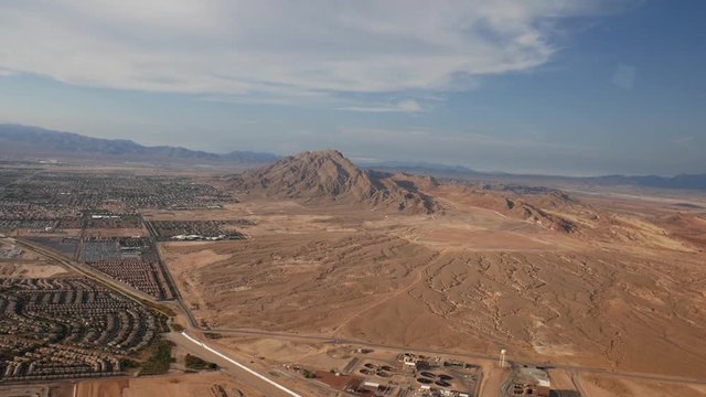 Helicopter shot of a red rock mountain near Las Vegas, Navada