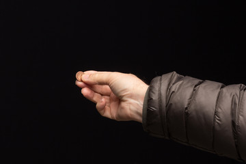Coins in a person's hand