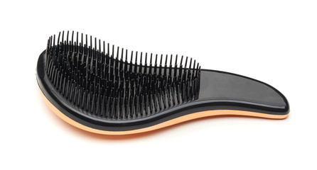 Modern design plastic hairbrush isolated on a white background
