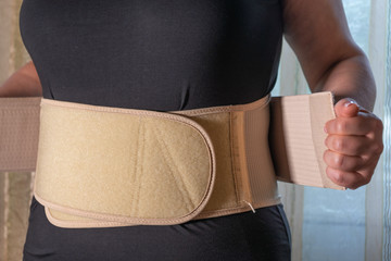 lumbosacral corset, a wide belt to support the back muscles, close up