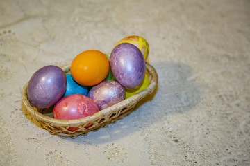 Painted festive Orthodox Easter eggs on a light background