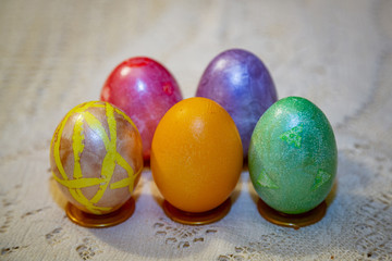 Painted festive Orthodox Easter eggs on a light background