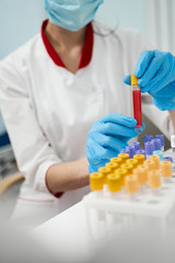 Close up of competent researcher that checking reagent