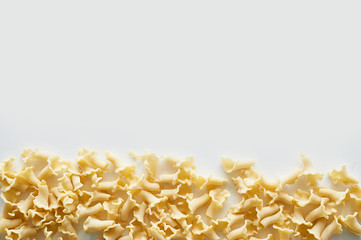 Pasta from hard wheat. Italian pasta. On a white background, on top of the place for text.