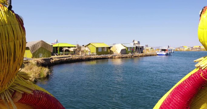 Peru Lake Titicaca panoramic view of floating islands from typical straw boat