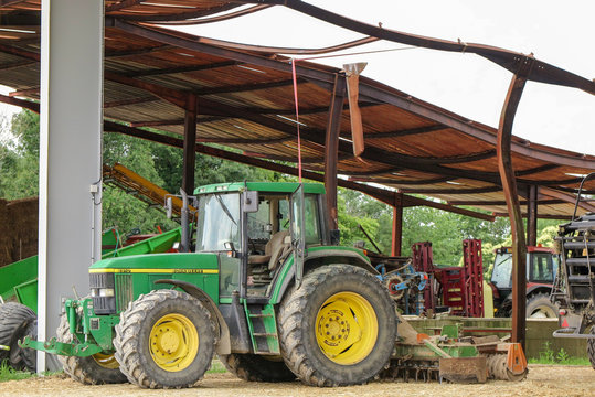 John Deer 6910 green tractor in farm