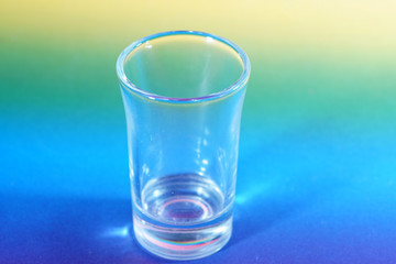 glass of water on blue background