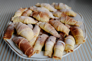 Delicious croissants with cinnamon sprinkling