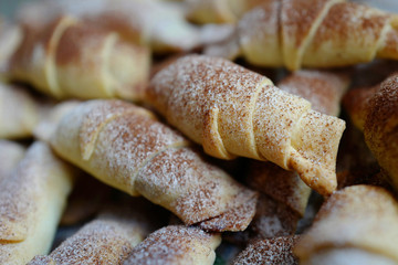 Delicious croissants with cinnamon sprinkling