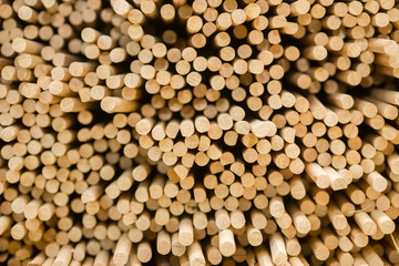 Round shaped wooden sticks stacked