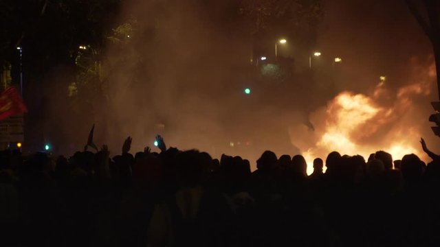 Fire, Chaos and Riots in the streets. People protesting and challenging the police