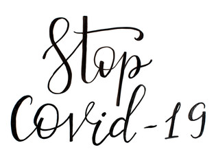 Black handwritten inscription STOP COVID-19 on a white background