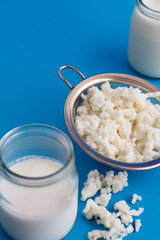 Fermented drink kefir in small bottles and kefir grains