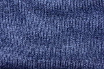Naklejka premium Dark blue clothing texture background. Vivid blue colour fabric surface, empty woven thread canvas, soft material pattern clothing, flat lay closeup top view image