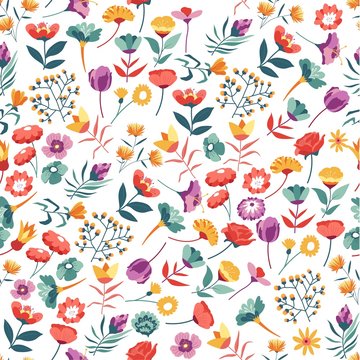Wildflowers, roses and daisy in blossom seamless pattern