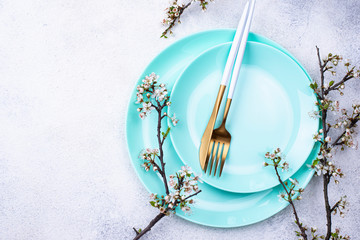 Spring table setting with blooming branch