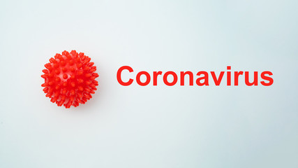 Inscription coronavirus red word on white back.