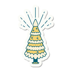 sticker of tattoo style snow covered pine tree
