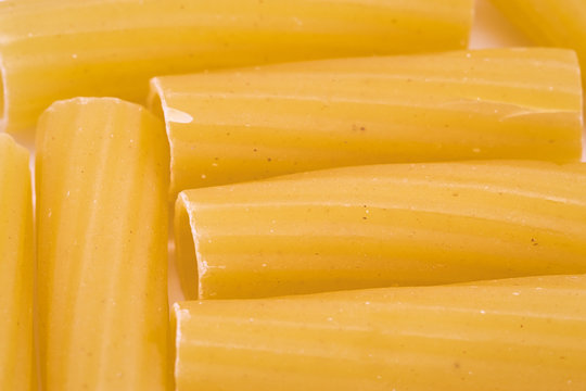 heap of pasta on white background