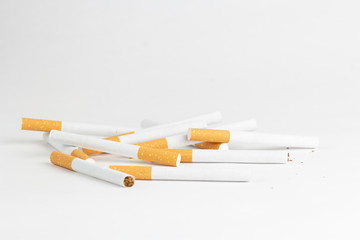 Cigarettes on a white background, tobacco is not a game