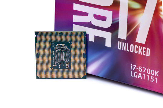 GLALTI, ROMANIA, November 04, 2016: Close-up of Intel Core i7-6700K with box isolated on white background. Founded in 1968, Intel is one of the worlds largest semiconductor chip makers.