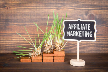 Affiliate Marketing. Green grass on the wooden steps