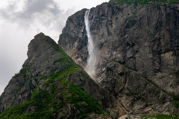 Fototapeta na wymiar Detail of Pissing Mare Falls at east end of Western Brook Pond with steep cliff fjords at Gros Morne National Park Newfoundland