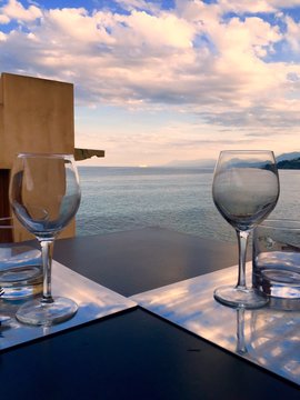 Close-up Of Dining Table Against Sky During Sunset