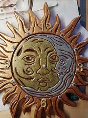 Clock in the shape of the sun