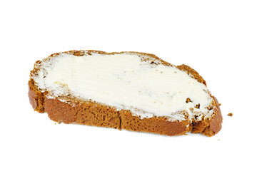 Slice of rye bread with butter, isolated on white
