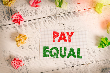 Text sign showing Pay Equal. Business photo text Principle of nondiscrimination in compensation for...