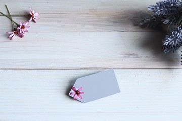 copy space background calming relaxing zen scene of scented flowers and candles , sea shells and reading while relaxing 