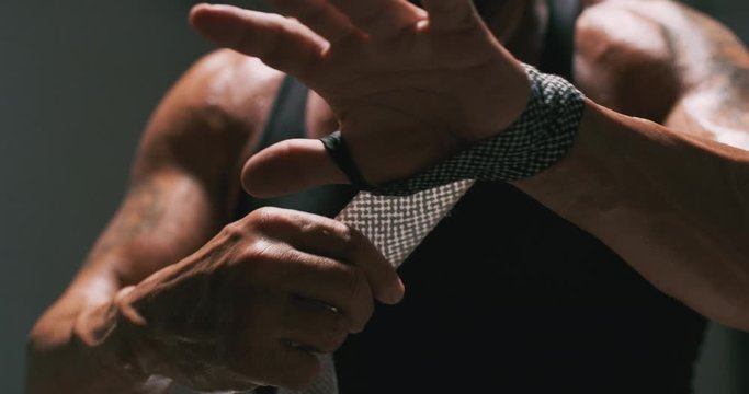 Fighter starting to wrap hand and wrist.