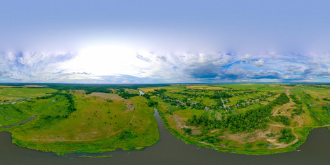 Fototapeta na wymiar 360-degree pano of Aerial view over the middle of a large river. Summer colourful landscape