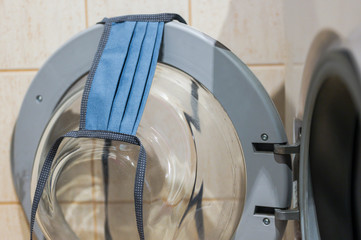 Obraz na płótnie Canvas Mask on a washing machine for cleaning