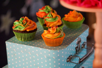 cupcakes with cream and flowers