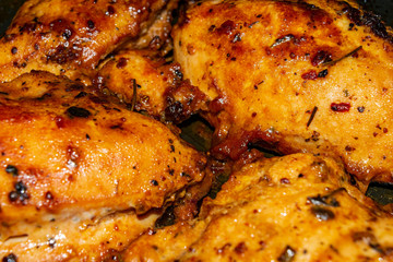 Chicken breast fried in the oven with spices. Close up.
