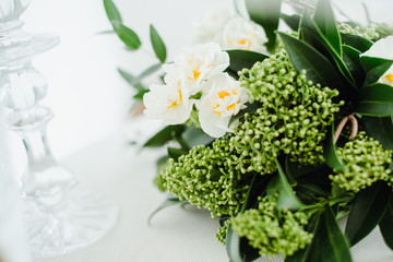 bouquet of daffodils with a brooch